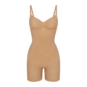SKIMS sculpting body suit mid thigh